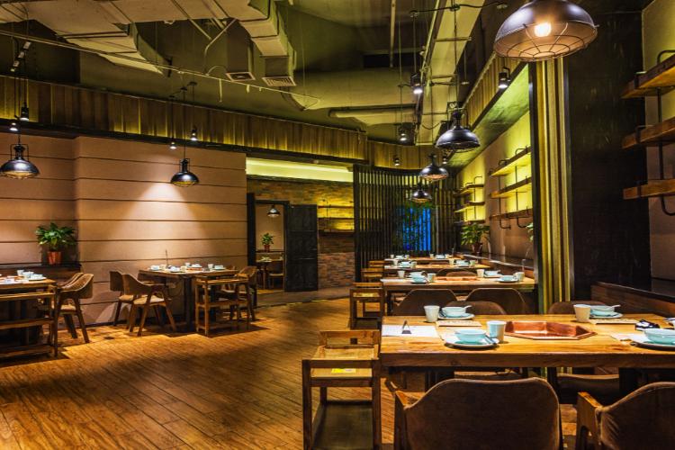 African restaurant interior with black and gold decor